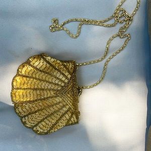 True vintage. Gold crossbody or clutch purse.